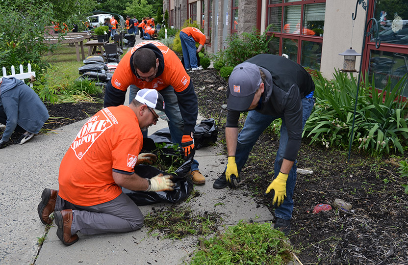 Volunteers working on landscaping